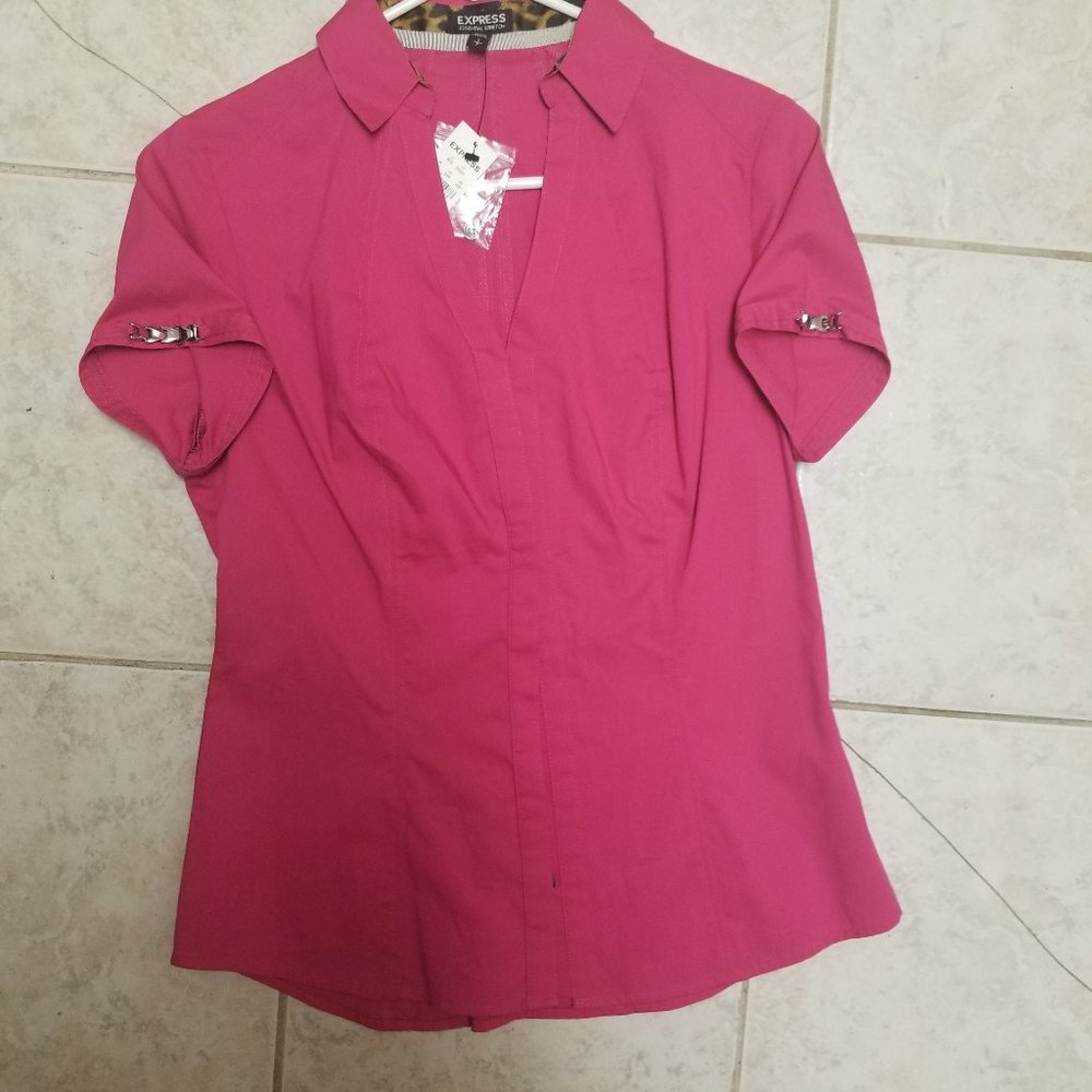 Pink sleeveless button down shirt